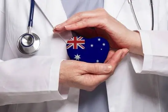 A doctor consulting an international student covered by OSHC in Australia
